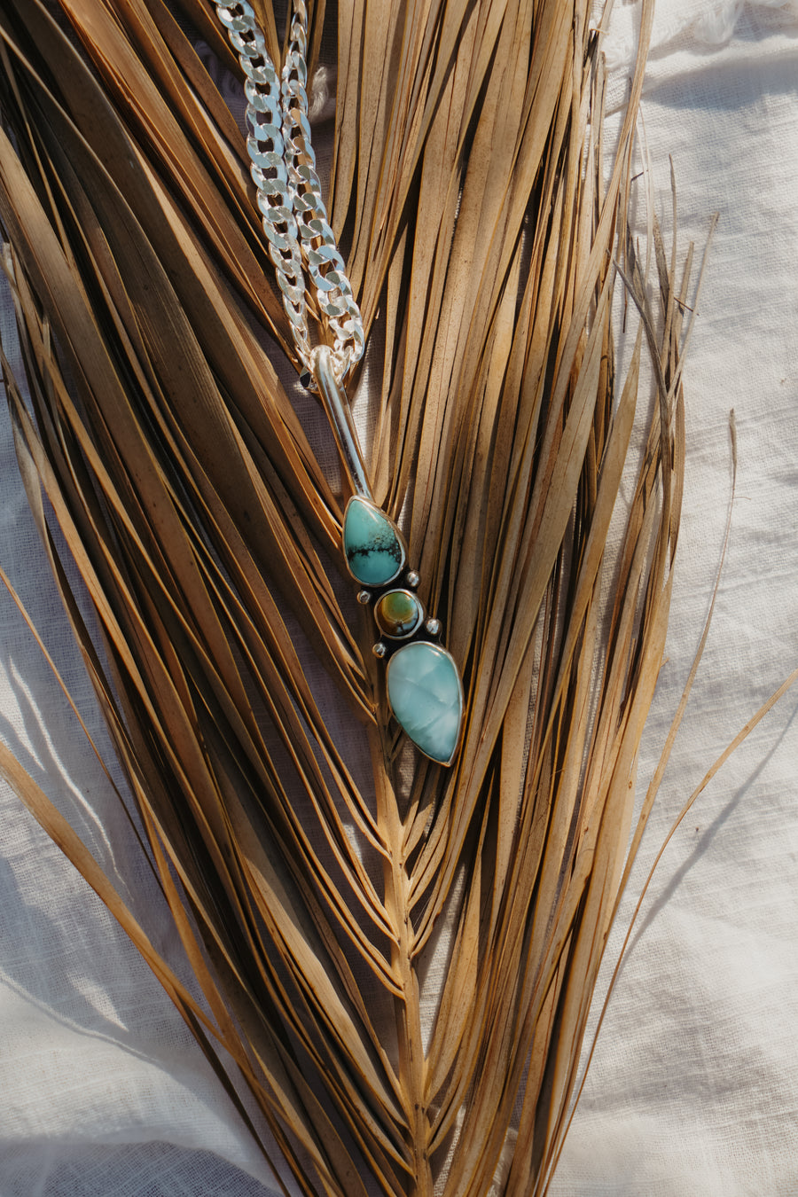 The Chrysalis Necklace in Larimar, Hubei, & Iron Maiden Turquoise