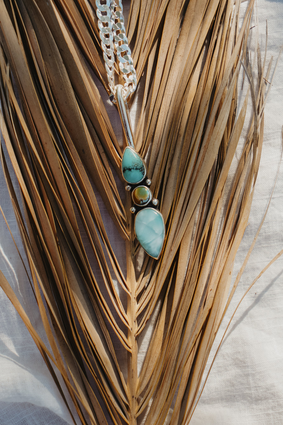 The Chrysalis Necklace in Larimar, Hubei, & Iron Maiden Turquoise
