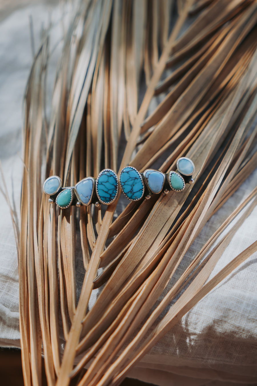 Ear Crawlers in Egyptian, Golden Hills, & Kingman Turquoise, and Larimar