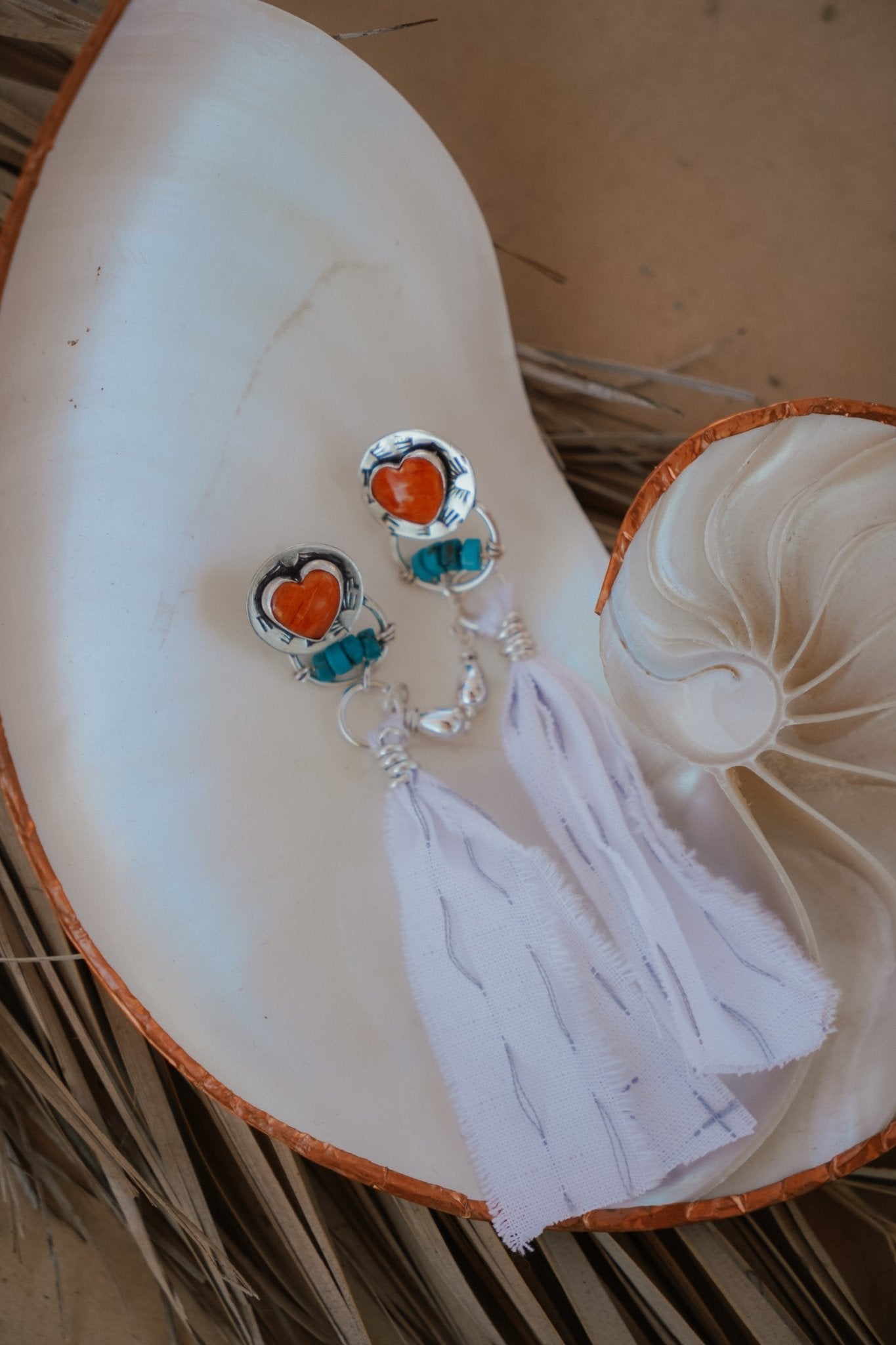 Earrings in Spiny Oyster Hearts - Golden Road Crafted