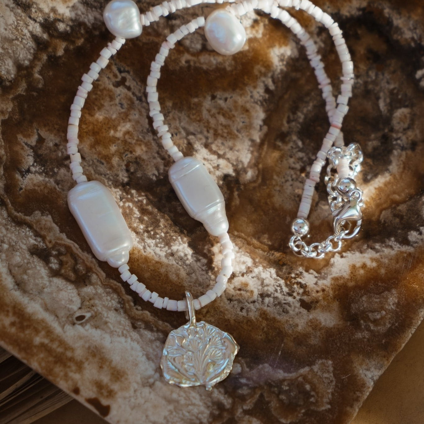 Puka Shell & Freshwater Pearl Necklace with Sterling Silver Flower Bouquet Charm - Golden Road Crafted