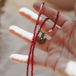 Shield Necklace in Red Beads - Golden Road Crafted