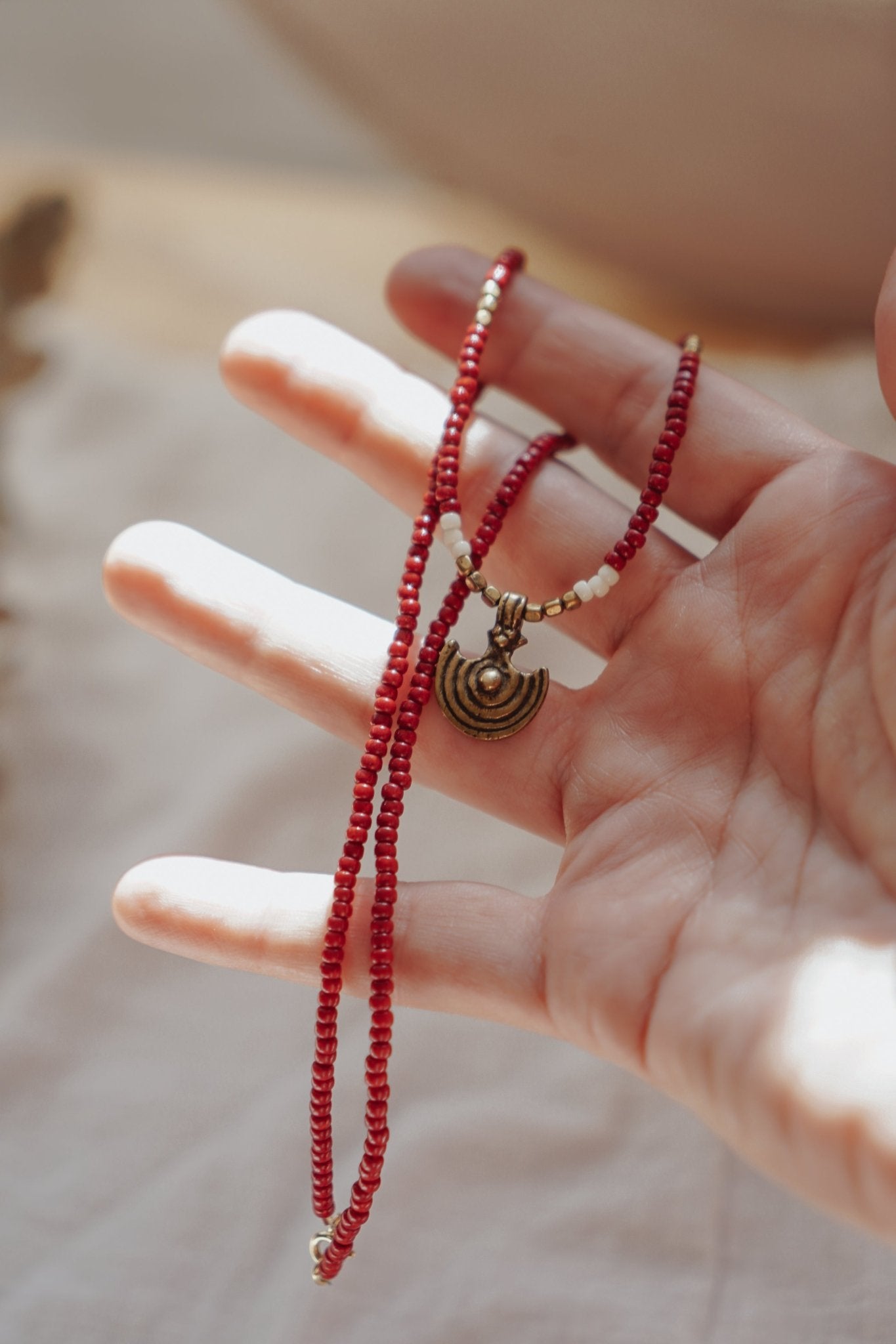 Shield Necklace in Red Beads - Golden Road Crafted