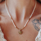 Shield Necklace in White Beads - Golden Road Crafted