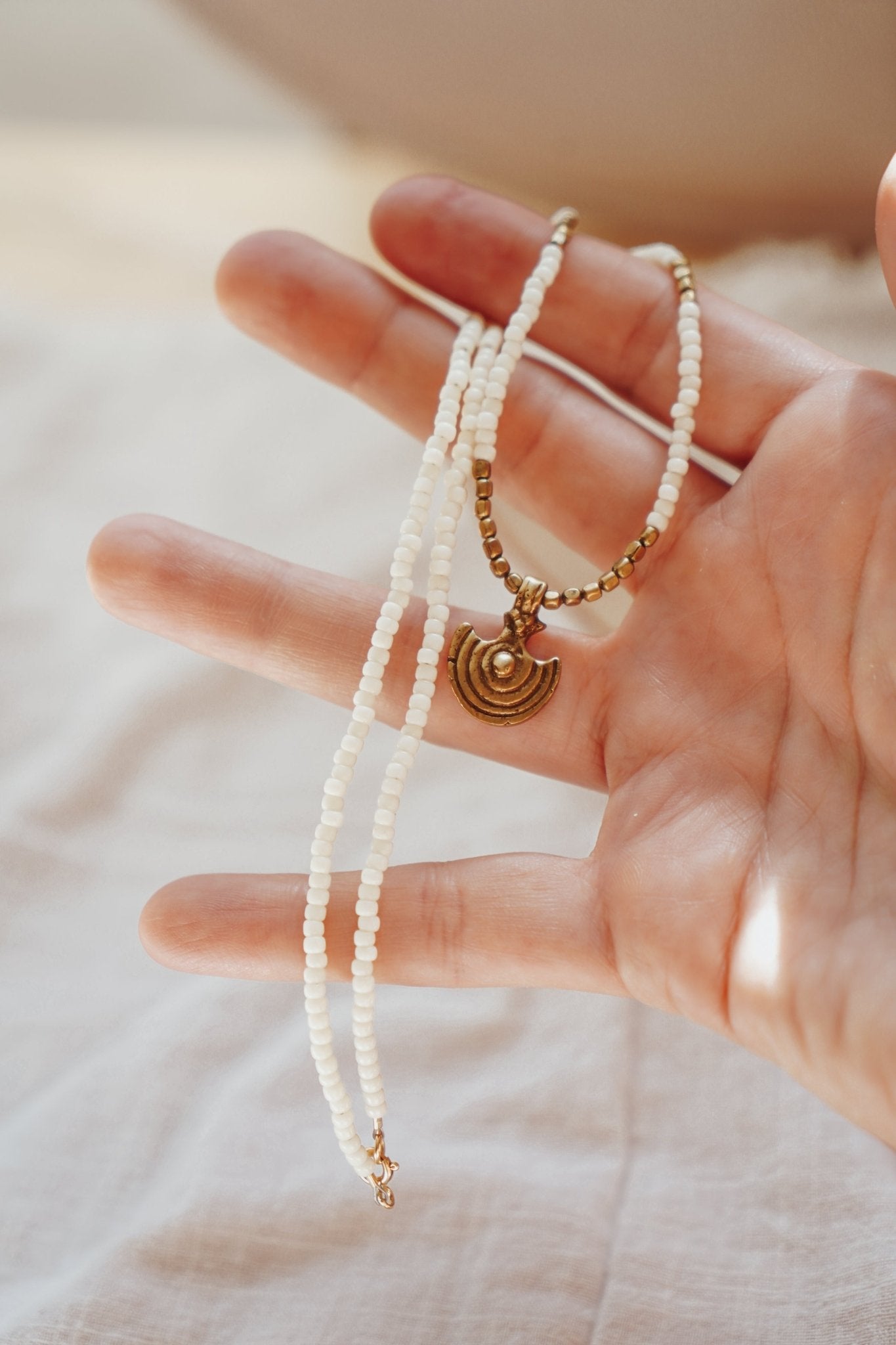 Shield Necklace in White Beads - Golden Road Crafted