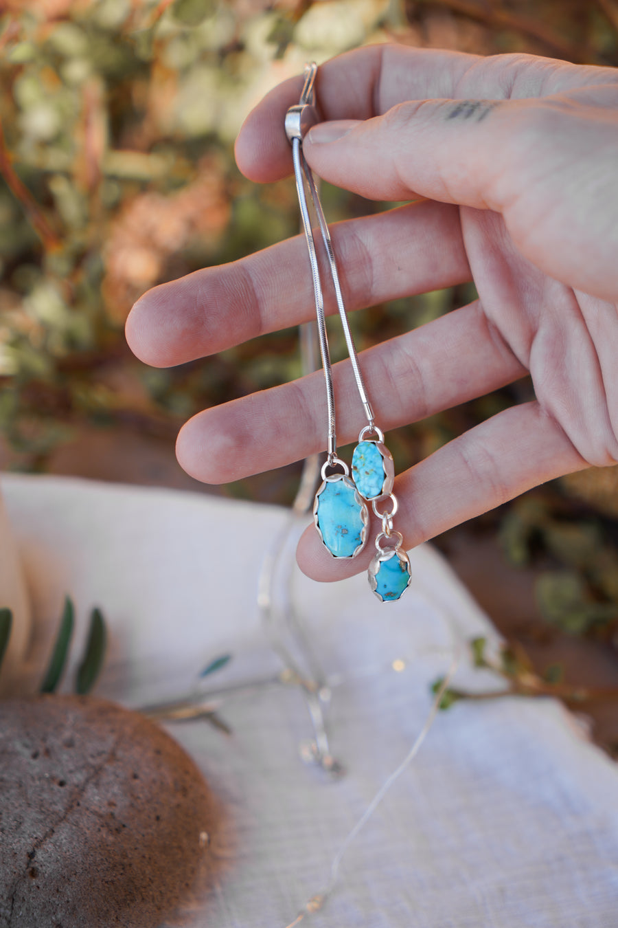 The Wilding Bolo in Turquoise Mountain & Crystal Quartz